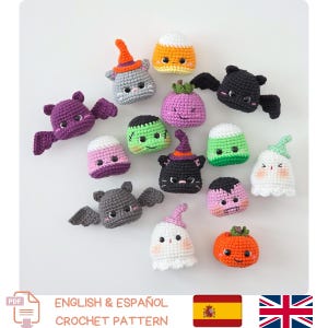 May include: A collection of small, handmade crochet figures featuring Halloween-themed characters including bats, ghosts, a pumpkin, candy corn, a black cat, and a Frankenstein monster. Each figure has embroidered facial features and small details.