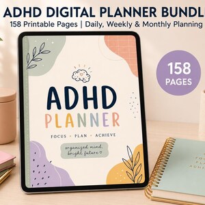 May include: A digital tablet displaying an ADHD planner bundle with 158 printable pages. The screen shows the text ADHD PLANNER, FOCUS PLAN ACHIEVE, and organised mind, bright future, decorated with colourful abstract shapes and leaf illustrations.