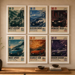 May include: A set of six framed posters featuring Japanese sports cars in various settings, including Mist Ascent, Blossom Smoke, Midnight Rush, Wave Spirit, Scarlet Sun, and Dragon Shadow. Each poster displays a car, Japanese text, and a year.