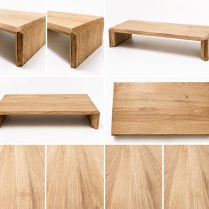 Puede incluir: Un soporte rectangular para monitor hecho de madera de roble de tono claro con una veta natural visible. El soporte cuenta con una superficie superior plana sostenida por dos paneles laterales sólidos, creando una estructura tipo puente.