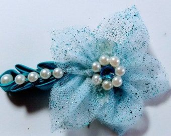 Snow Princess Flower with Teal Leaf Detail