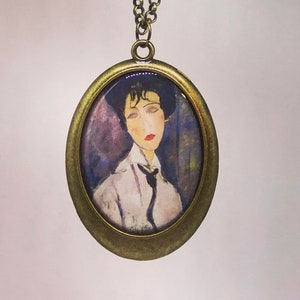 Arty necklace: Modigliani. Large pendant necklace. Woman with a black tie. Femme à la cravate noire. Style. Art. Fashion. Dark academia.