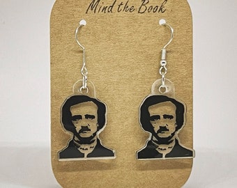 Bookish earrings: Edgar Allan Poe. Nevermore Academy. Wednesday Addams. Gothic horror. The Black Cat. The Raven. Literary gifts. Eurovision.