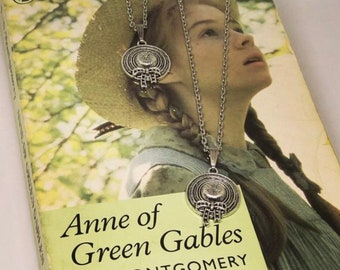 Bookish necklace: Anne of Green Gables hat charm necklace. Anne with an E. Why not get one extra for your bosom friend! BESTSELLER