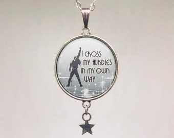 Pop culture necklace: Freddie Mercury quote "I cross my hurdles in my own way". For fans of Queen and the film Bohemian Rhapsody.