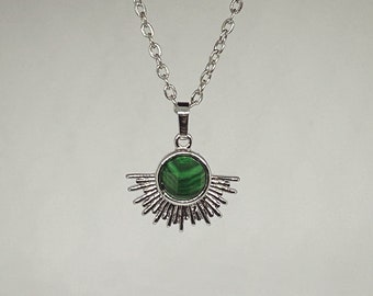 Art deco style green necklace: malachite talisman for transformation and travel. Sunburst shape. English seaside. Coastal. Holiday. Spring.