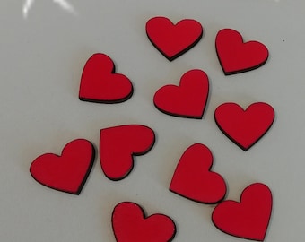 Wooden hearts red for our guestbook frames to the wedding as a supplement