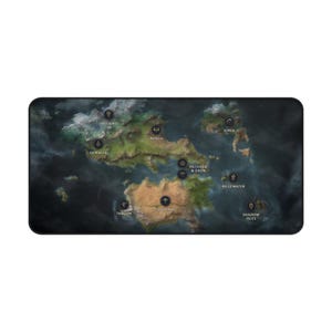 May include: A rectangular desk mat featuring a detailed fantasy map of Runeterra. The map displays labeled regions including Freljord, Demacia, Noxus, Piltover & Zaun, Ionia, Bilgewater, Targon, Shurima, and Shadow Isles, set against a dark, atmospheric background.