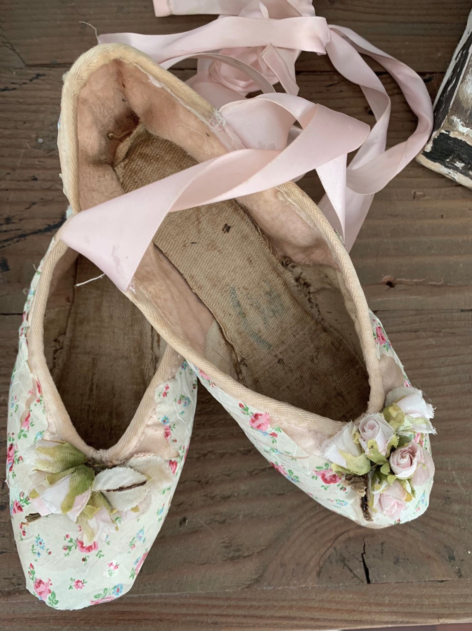 custom vintage well worn pink ballet ballerina slippers pointe shoes embellished with antique french fabric millinery roses dits