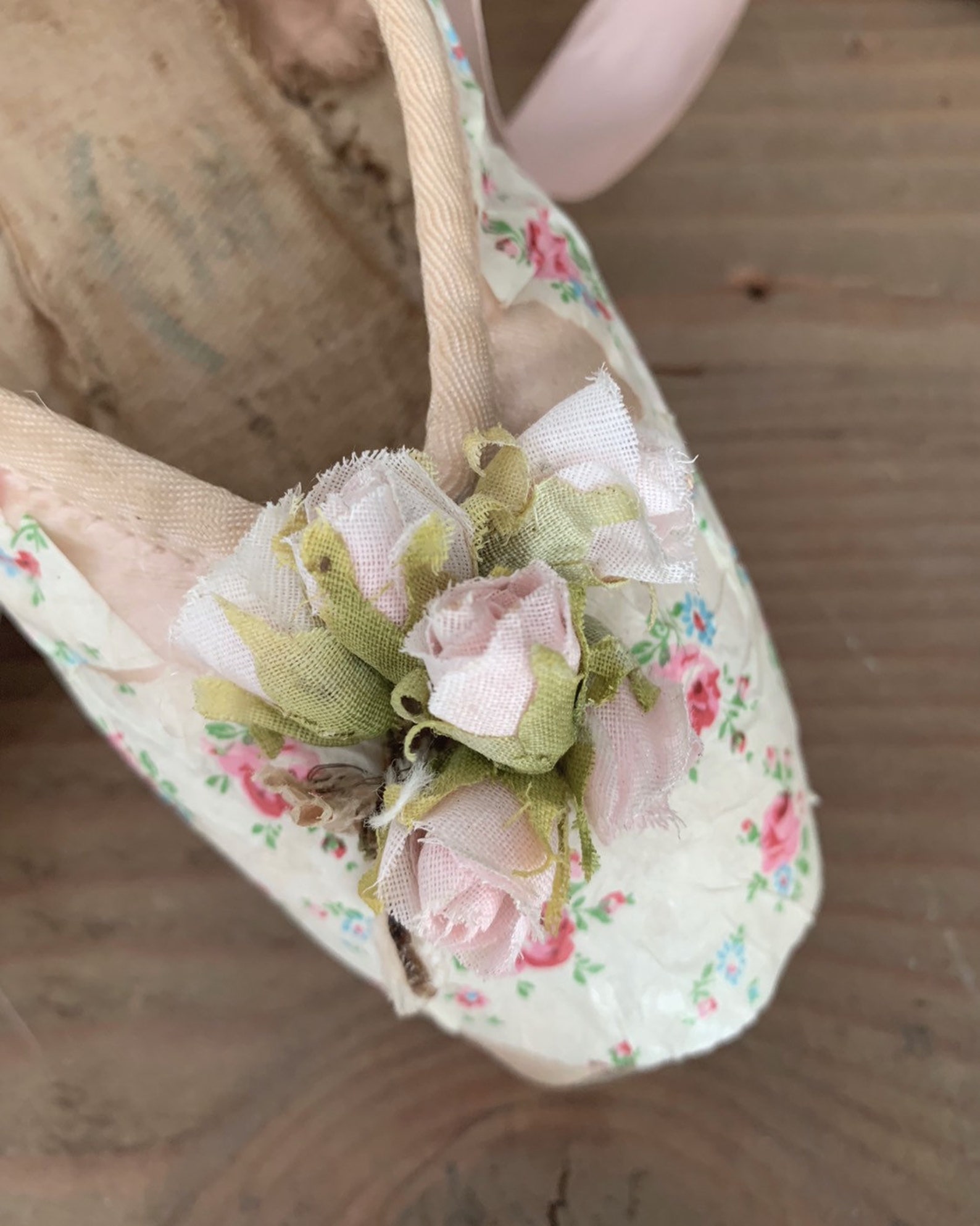 custom vintage well worn pink ballet ballerina slippers pointe shoes embellished with antique french fabric millinery roses dits