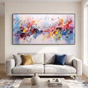 Puede incluir: Una pieza de arte mural rectangular que presenta una pintura abstracta vibrante con pinceladas gruesas y texturizadas en tonos rojo, azul, amarillo y blanco, superpuesta con notas musicales y pentagramas negros, enmarcada en un borde negro fino.