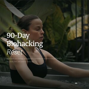 May include: A person in a black sports bra sits in a cold plunge tub filled with ice. The text reads: RECOVERY COMPASS, PROGRAMME, 90-Day Biohacking Reset, Work with your biology, not against it. Optimise the systems that govern how you think, feel, and perform every day.