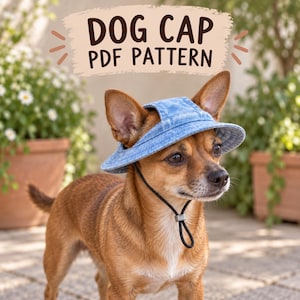 May include: A light blue denim dog cap with a wide brim and a black adjustable chin strap. The cap features ear holes and is displayed on a brown dog. Above the dog, text reads DOG CAP PDF PATTERN in dark brown letters on a beige background.