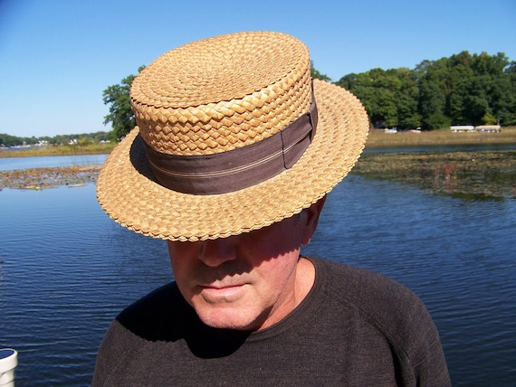 This is an antique Men's Straw Boater Hat.J.C.Penn