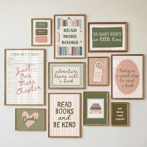May include: A gallery wall set of eleven framed prints featuring book-themed illustrations and typography. The collection includes posters with text like "Read More Books," "Just One More Chapter," and "So Many Books, So Little Time" in a palette of sage green, soft pink, and cream.