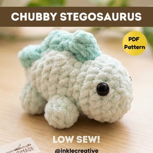 May include: A light mint green crocheted stegosaurus plush toy with a rounded body, small legs, and dorsal plates. The image includes the text CHUBBY STEGOSAURUS, PDF Pattern, LOW SEW!, and inklecreative. The toy features two black plastic eyes.