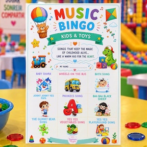 Puede incluir: Una tarjeta de juego Music Bingo Kids & Toys con ilustraciones coloridas de un globo aerostático, tren, cometa y varios personajes. El texto incluye títulos de canciones como Baby Shark, Wheels on the Bus y Phonics Song.