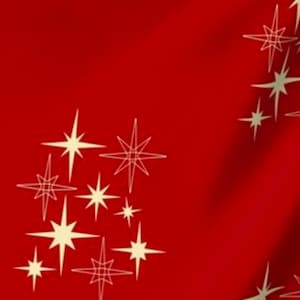 May include: Red fabric with a white starburst pattern. The stars are stylised and have a retro look.