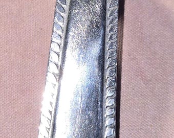 Handmade money clip made from upcycled spoon