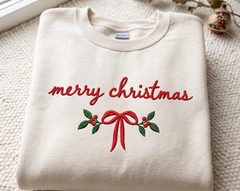 Weihnachtspullover mit Stickerei: Frohe Weihnachten Schleifendesign