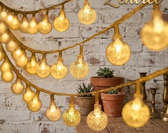 Guirnalda de luces LED cálidas con forma de globo, alimentada por USB o pilas, ideal para la decoración de dormitorios, bodas, patios y hogares acogedores.