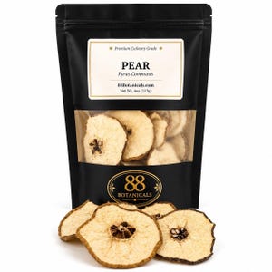 May include: A black stand-up pouch containing dried pear slices, labeled Premium Culinary Grade PEAR Pyrus Communis 88Botanicals.com Net Wt. 4oz (113g). Several light tan, circular dehydrated pear slices with visible cores are arranged in front.