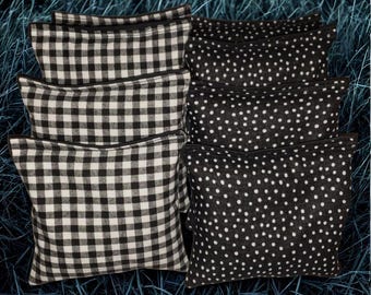 Bolsas de Cornhole blancas y negras
