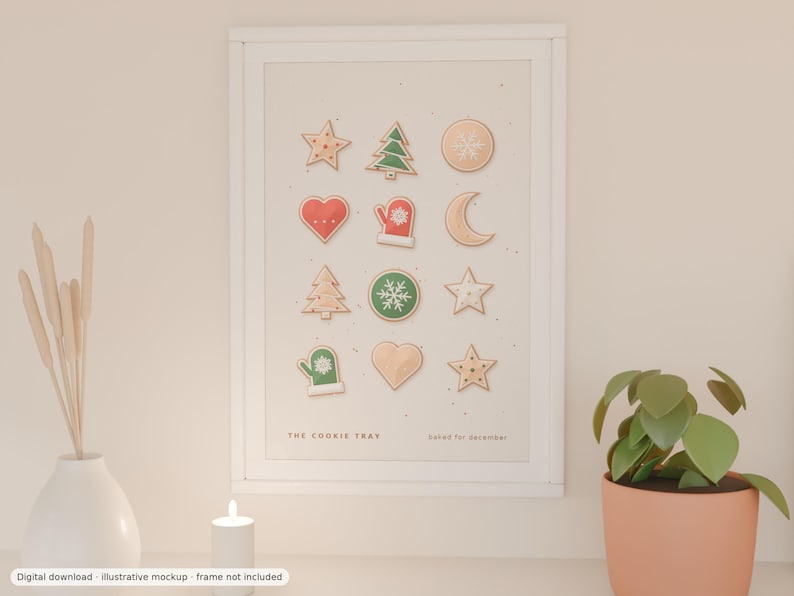 Puede incluir: Un cuadro de pared con marco blanco que muestra una cuadr&iacute;cula de doce galletas navide&ntilde;as ilustradas, incluyendo estrellas, &aacute;rboles, corazones, un guante y una luna creciente. El texto THE COOKIE TRAY y baked for december aparece en la parte inferior.