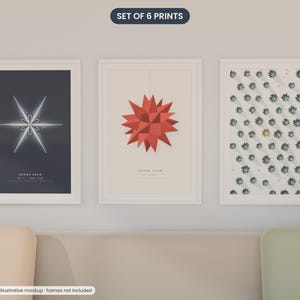 May include: A set of three framed wall art prints. The left print features a white geometric star on a dark gray background. The center print shows a red paper star on a beige background. The right print displays a grid of green succulents.