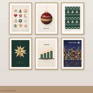 May include: A set of six framed wall art prints featuring holiday themes: cookie shapes, a red ornament labeled Ribbon Bauble, a green knit pattern labeled Nordic Knits, a gold star labeled Paper Star, four candles labeled Advent, and a city scene labeled Canal Lights.