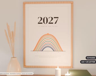 May include: A vertical poster in a light wood frame featuring the text 2027 A YEAR OF SUN PATHS. Below the text is a graphic illustration of multiple concentric coloured arcs representing sun paths. The poster includes 13 pages in A4 and US Letter sizes.