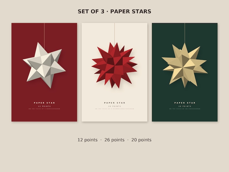 Może przedstawiać: Zestaw trzech papierowych gwiazd z napisem SET OF 3 PAPER STARS. Pierwsza to biała 12-ramienna gwiazda na czerwonym tle, druga to czerwona 26-ramienna gwiazda na kremowym tle, a trzecia to złota 20-ramienna gwiazda na ciemnozielonym tle.