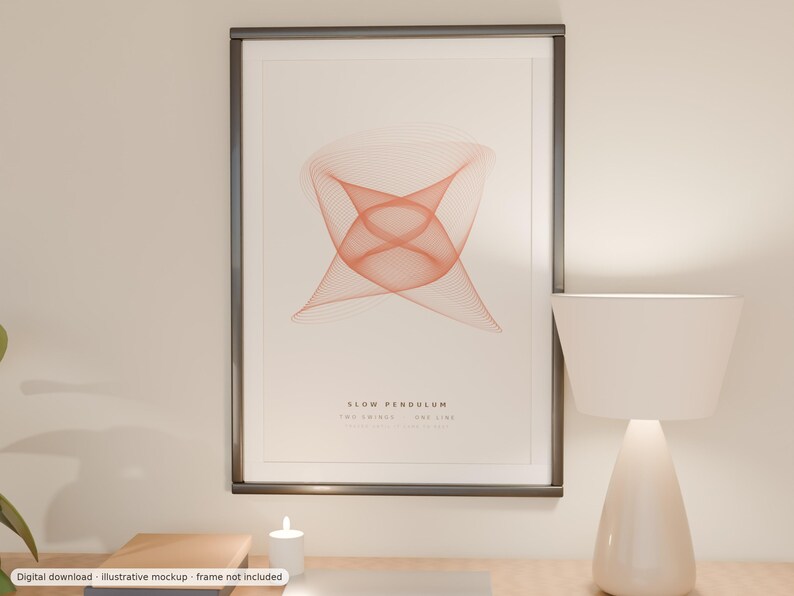 May include: A framed wall art print featuring a geometric orange line art design centered on a light background. The text SLOW PENDULUM and TWO SWINGS ONE LINE is printed in black below the graphic. The frame is dark gray with a thin profile.