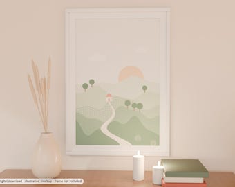 May include: A framed wall art print featuring a landscape illustration of rolling green hills, a winding path, a small house with a pink roof, and a pale orange sun. The artwork is displayed in a white frame on a surface with a vase of dried reeds.