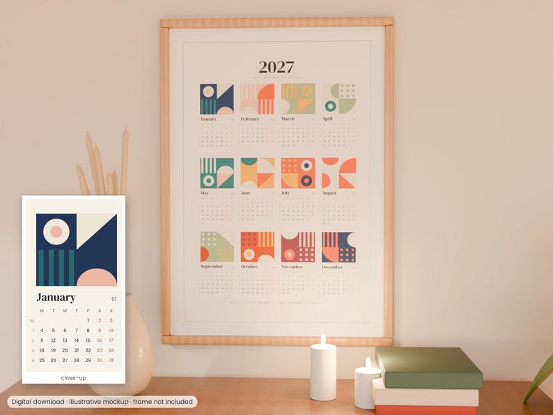May include: A 2027 wall calendar featuring twelve monthly sections, each with a unique geometric graphic in shades of blue, orange, green, and pink. The calendar displays the year 2027 at the top, with months listed from January to December.
