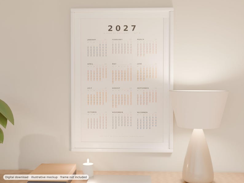 Puede incluir: Un calendario de pared vertical para el a&ntilde;o 2027 en un marco blanco. El calendario presenta un dise&ntilde;o limpio con el a&ntilde;o 2027 en la parte superior, seguido de doce cuadr&iacute;culas mensuales dispuestas en columnas, mostrando las fechas en texto negro y claro.