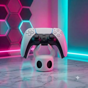 May include: A white and black wireless game controller resting on a white, horn-shaped stand. The controller features a central PlayStation logo, dual analog sticks, a directional pad, and four action buttons with geometric symbols on the right side.