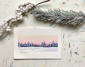 Sunset winter original small pink brilliant sky painting on watercolor paper, snowy trees, pink setting sun painting.