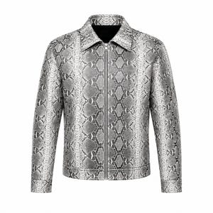 May include: A long-sleeve jacket featuring a grey and black snakeskin pattern throughout. The garment includes a pointed collar, a full-length silver-toned metal zipper closure down the center, and buttoned cuffs at the end of each sleeve.