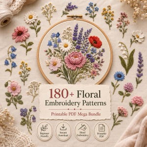 May include: A wooden embroidery hoop containing a floral design with pink, red, blue, and white flowers. Surrounding the hoop are individual embroidered flower stems. A paper label reads 180+ Floral Embroidery Patterns Printable PDF Mega Bundle.