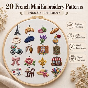 May include: A wooden embroidery hoop containing white fabric with 20 small embroidered French-themed icons, including the Eiffel Tower, a croissant, macarons, a baguette, a bicycle, a perfume bottle, a clock, and a fleur-de-lis, numbered 1 through 20.