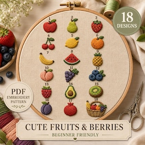 May include: An embroidery hoop containing 18 stitched fruit and berry designs on beige fabric, numbered 1 through 18. The designs include an apple, pear, strawberry, cherries, lemon, orange, banana, watermelon, pineapple, peach, grapes, blueberries, raspberry, avocado, kiwi, plum, pomegranate, and a fruit basket.