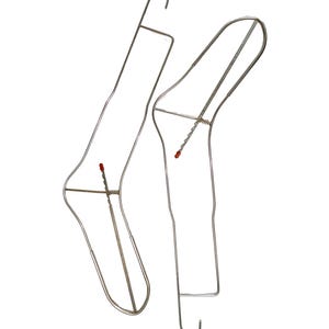 May include: Two metal sock blockers, designed to maintain the shape of socks during drying. The wire frames are silver-colored, with red accents at the ankle. Each blocker has a hook at the top for hanging.