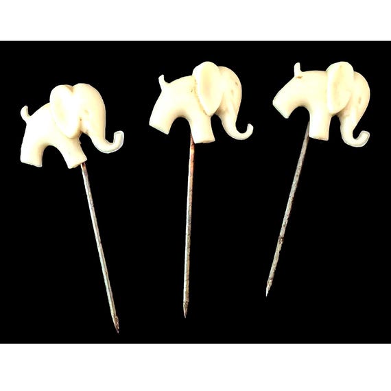 1950s Metzeler Motorcycle Tyres White Plastic Elephant Lapel Pins
