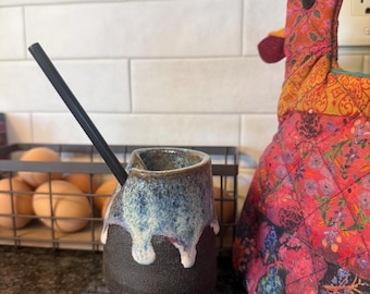 Ceramic cup with straw hole