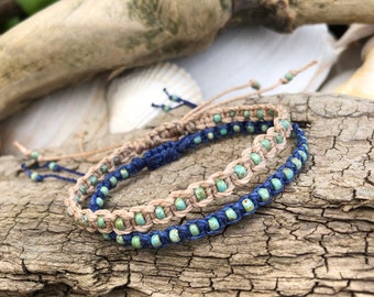 Macrame bracelet with brass cat charm and glass rainbow tube and seed beads and square light pink glass beads