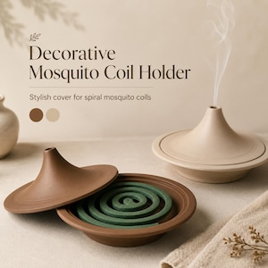 May include: A brown and a beige ceramic mosquito coil holder with a conical lid. The brown holder is open, revealing a green spiral mosquito coil inside. The text reads: Decorative Mosquito Coil Holder. Stylish cover for spiral mosquito coils.