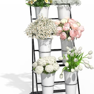 May include: A black metal tiered plant stand on wheels featuring six white tapered pots. The pots contain various floral arrangements including yellow daisies, white baby's breath, white daisies, pink peonies, white hydrangeas, and white tulips.