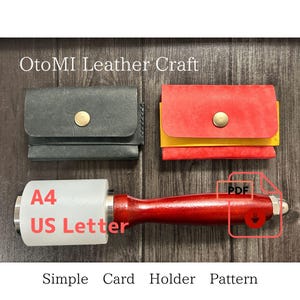 May include: Two leather card holders, one black and one red with a yellow accent, each featuring a brass snap button. Below them is a mallet with a white head and red handle. Text reads OtoMI Leather Craft, A4, US Letter, and Simple Card Holder Pattern.