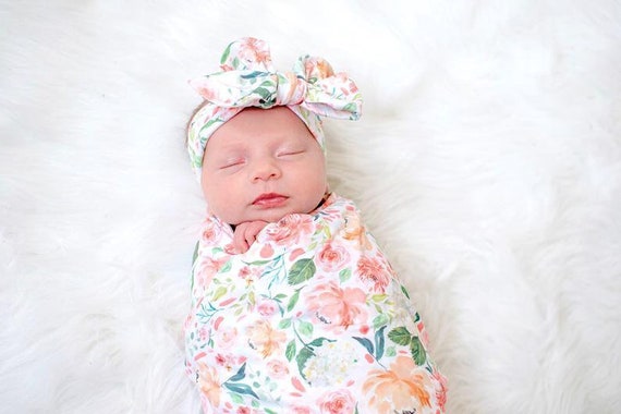 newborn girl swaddle and headband